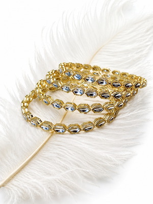 Gold-toned crystal bangles set of 4 for women kundan-style stones, stackable design, festive wear, hexagonal motifs. 1