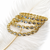 Gold-toned crystal bangles set of 4 for women kundan-style stones, stackable design, festive wear, hexagonal motifs.