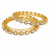 Gold-toned kundan bangles with teardrop stones, set of 2 filigree design, ethnic wear, white stone embellished.
