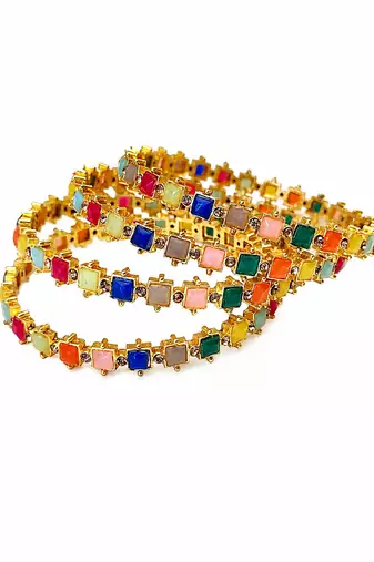 Gold-toned kundan bangles with teardrop stones, set of 2 filigree design, ethnic wear, white stone embellished.