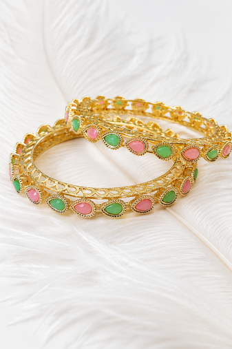 Gold-toned bangles with pink & green teardrop stones, set of 2 filigree design.