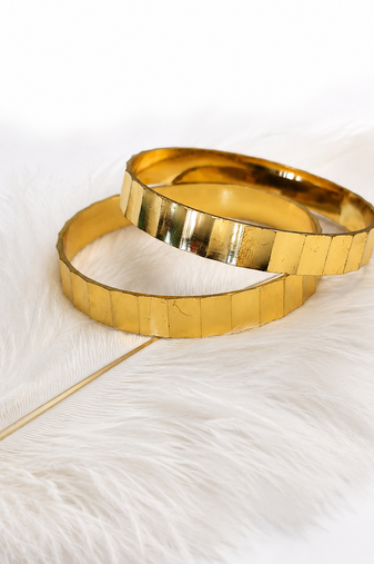 Gold-toned faceted bangle set of 2 for women geometric faceted design, mirror polish finish, stackable bangles.