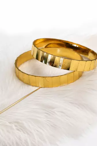 Gold-toned faceted bangle set of 2 for women geometric faceted design, mirror polish finish, stackable bangles.
