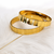 Gold-toned faceted bangle set of 2 for women geometric faceted design, mirror polish finish, stackable bangles.