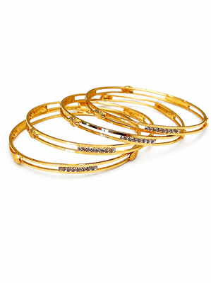 Gold-plated bangle set with crystal embellishments, set of 4 diamond-cut accents, women's jewellery, stackable design. 3