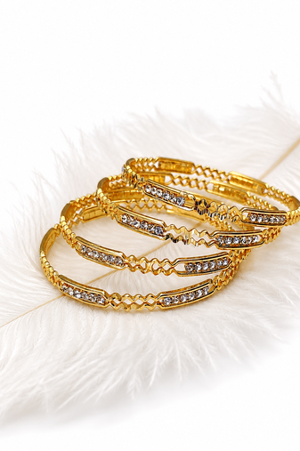 Gold-toned crystal studded bangles set of 4 for women rhinestone embellished, stackable design, ethnic wear.