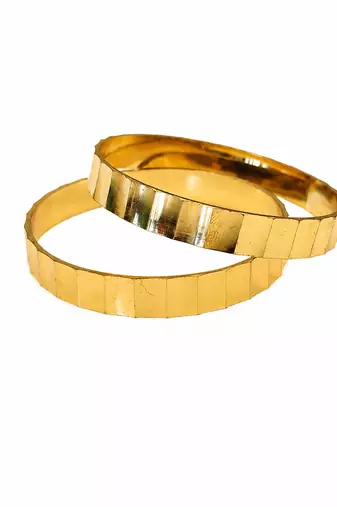 Gold-toned faceted bangle set of 2 for women geometric faceted design, mirror polish finish, stackable bangles.