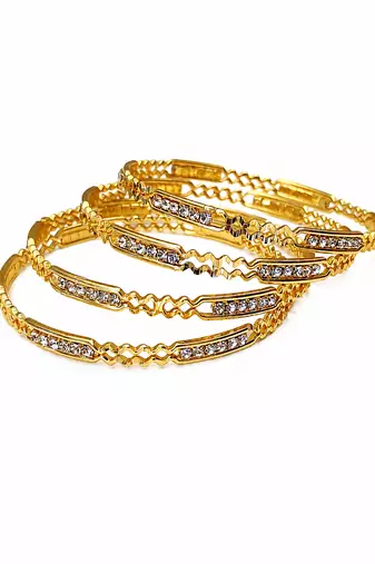 Gold-toned crystal studded bangles set of 4 for women rhinestone embellished, stackable design, ethnic wear.