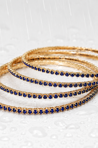 Blue crystal stone bangles, gold-toned, set of 4 stackable design, studded with crystals, festive wear, waterproof.