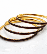 Gold-toned maroon enamel bangle set for women, set of 4 enamel finish, stackable design.