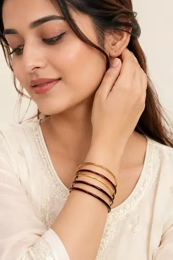 Gold-toned maroon enamel bangle set for women, set of 4 enamel finish, stackable design.