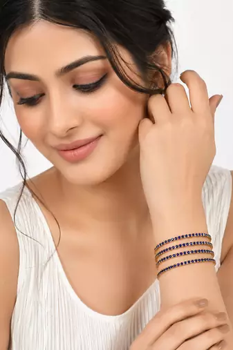 Blue crystal stone bangles, gold-toned, set of 4 stackable design, studded with crystals, festive wear, waterproof.