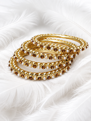 Gold-toned pearl and crystal studded bangles set amber crystal stones, faux pearl accents 1
