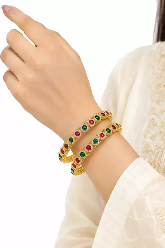Gold-toned bangles with red and green stone set of 2 filigree design, round cabochon stones