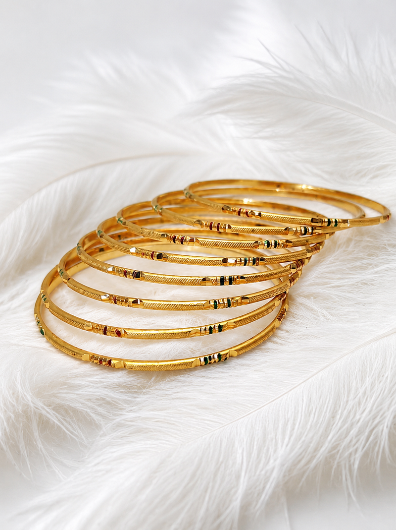 Gold-toned bangle set with enamel detail