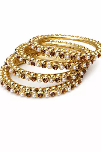 Gold-toned pearl and crystal studded bangles set amber crystal stones, faux pearl accents