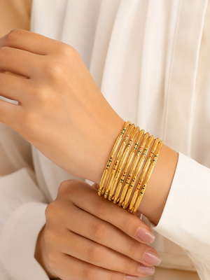 Gold-toned bangle set with enamel detail 2
