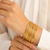 Gold-toned bangle set with enamel detail