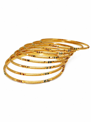 Gold-toned bangle set with enamel detail 3