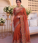 winning rust orange c-pallu embroidery with piping border fendy satin indian wedding saree