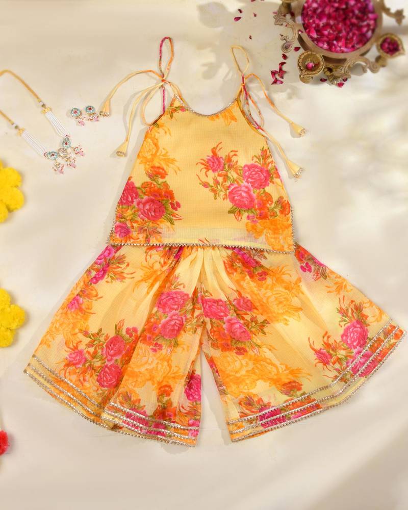 Sunshine yellow floral kota doria tie-up top & flared palazzo set