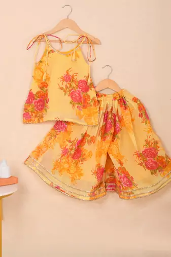 Sunshine yellow floral kota doria tie-up top & flared palazzo set
