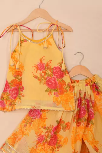Sunshine yellow floral kota doria tie-up top & flared palazzo set