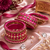 Magenta silk thread bangle set