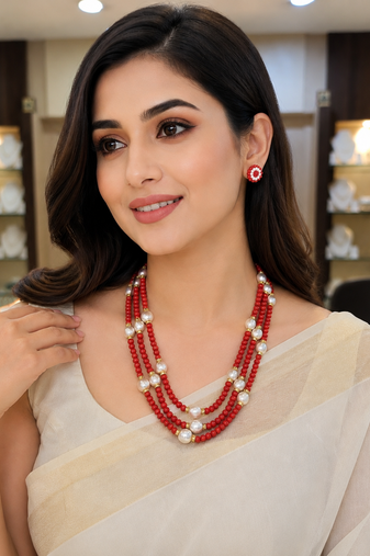 Gold-tone spacers, floral stud earrings, traditional indian wear, multi-strand design, red & white colour