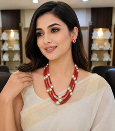 Gold-tone spacers, floral stud earrings, traditional indian wear, multi-strand design, red & white colour