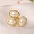 Gold tone pearl statement ring