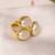 Gold tone pearl statement ring