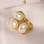 Gold tone pearl statement ring