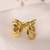 Twisted gold tone statement ring