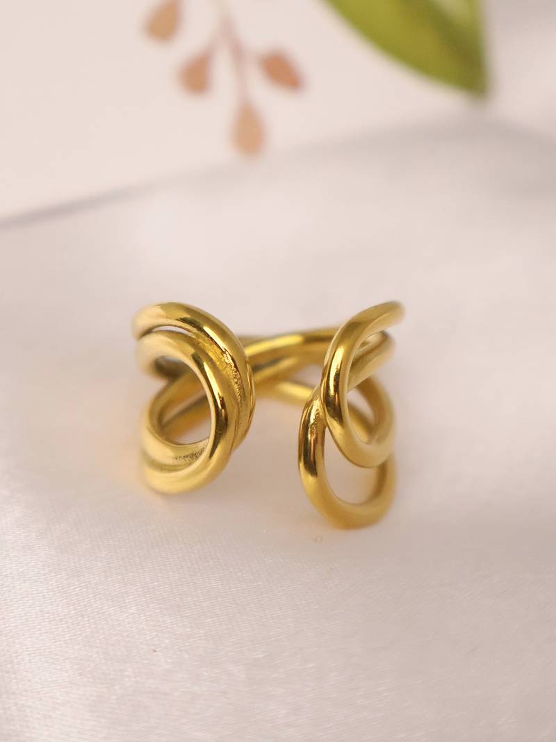 Twisted gold tone statement ring