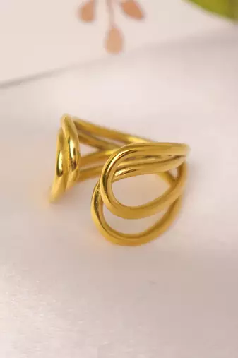 Twisted gold tone statement ring