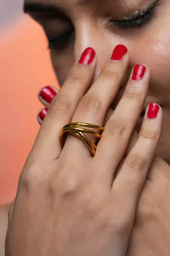 Twisted gold tone statement ring
