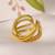 Twisted gold tone statement ring