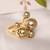 Multi pearl gold tone statement ring