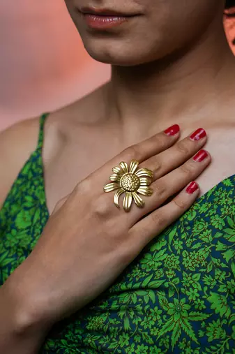 Floral gold tone statement ring