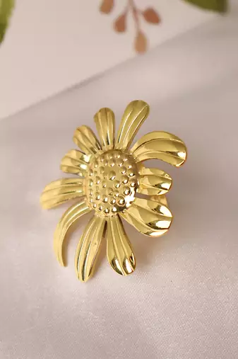 Floral gold tone statement ring