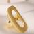 Oval gold tone statement ring