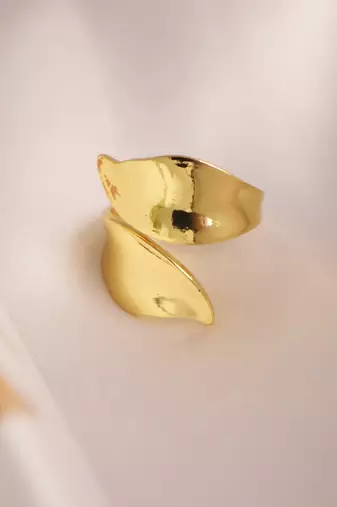 Curved gold tone statement ring