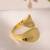 Curved gold tone statement ring