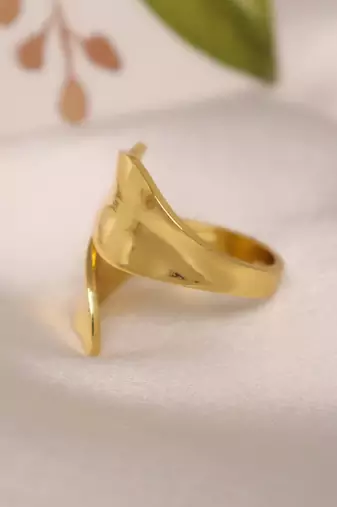 Curved gold tone statement ring