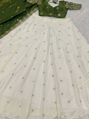 off white silk lehenga with green zari blouse 6