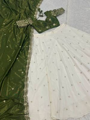 off white silk lehenga with green zari blouse 7