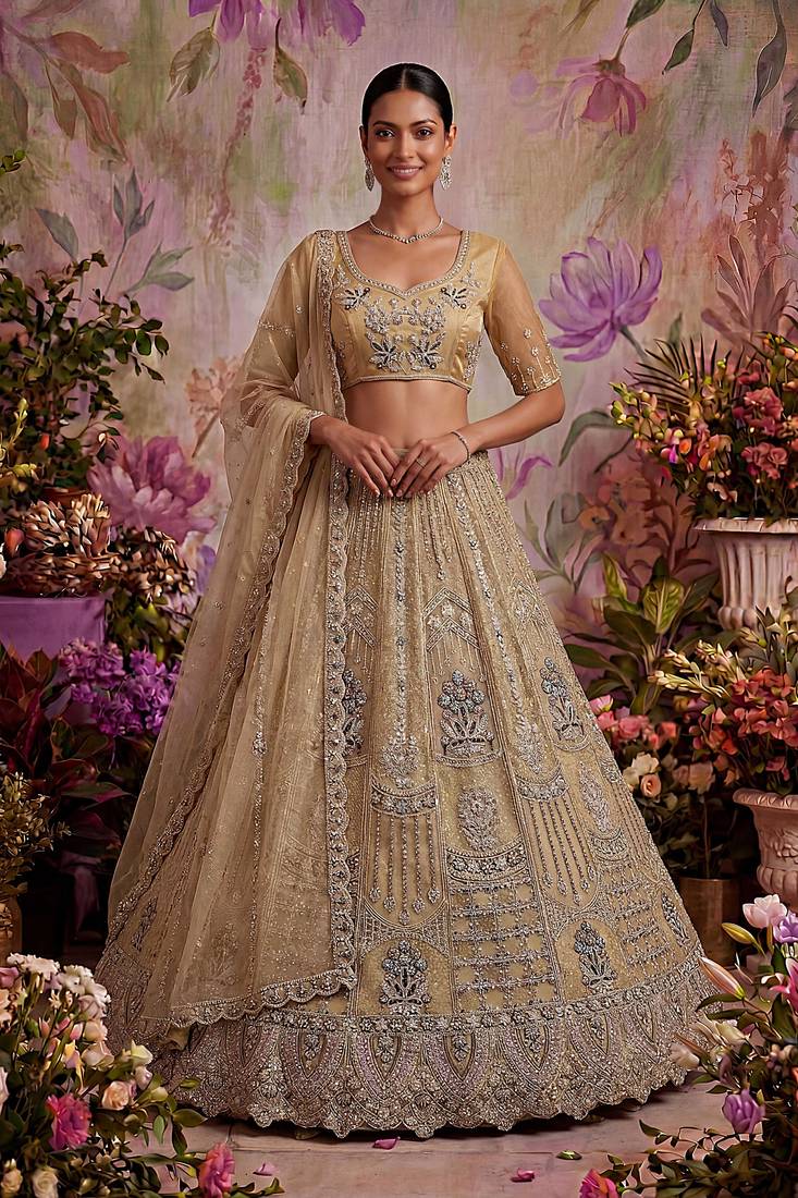 beige embroidered net unstitched lehenga choli with dupatta