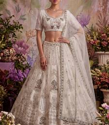 off white embroidered net unstitched lehenga choli with dupatta