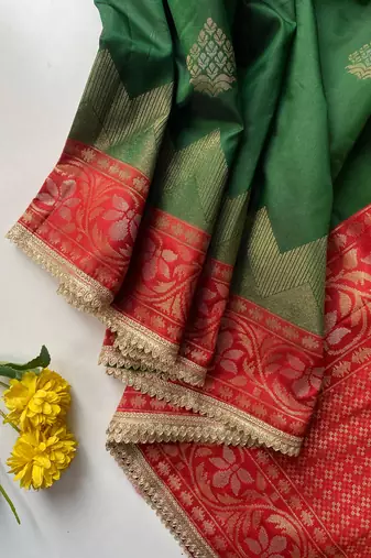 dark green color zari weaves contrast pallu and designer chaap border silk blend saree